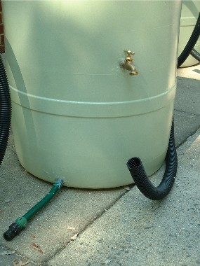 Barrel with hose and tap